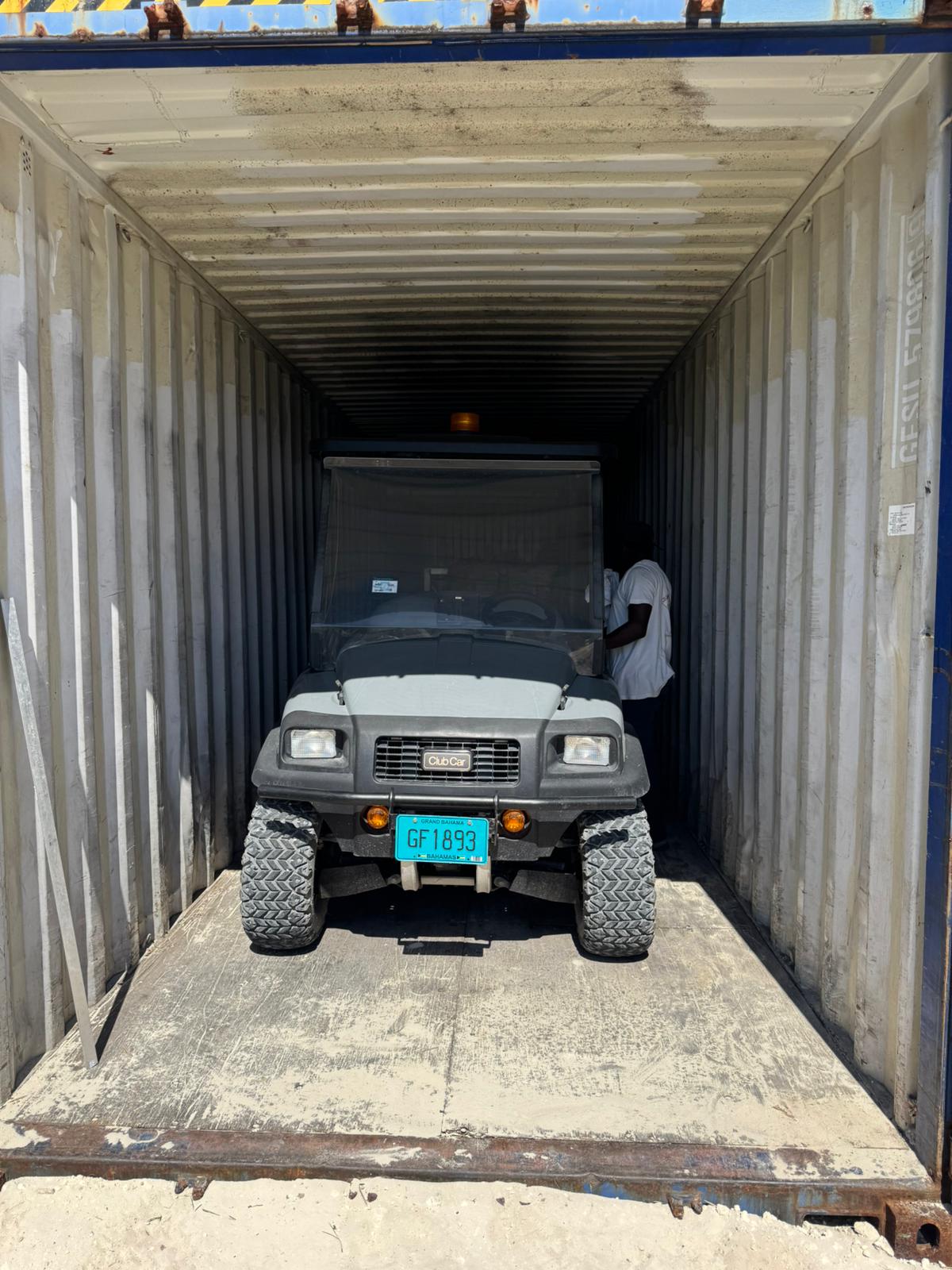 Vehicle cargo documented inside a container during a survey