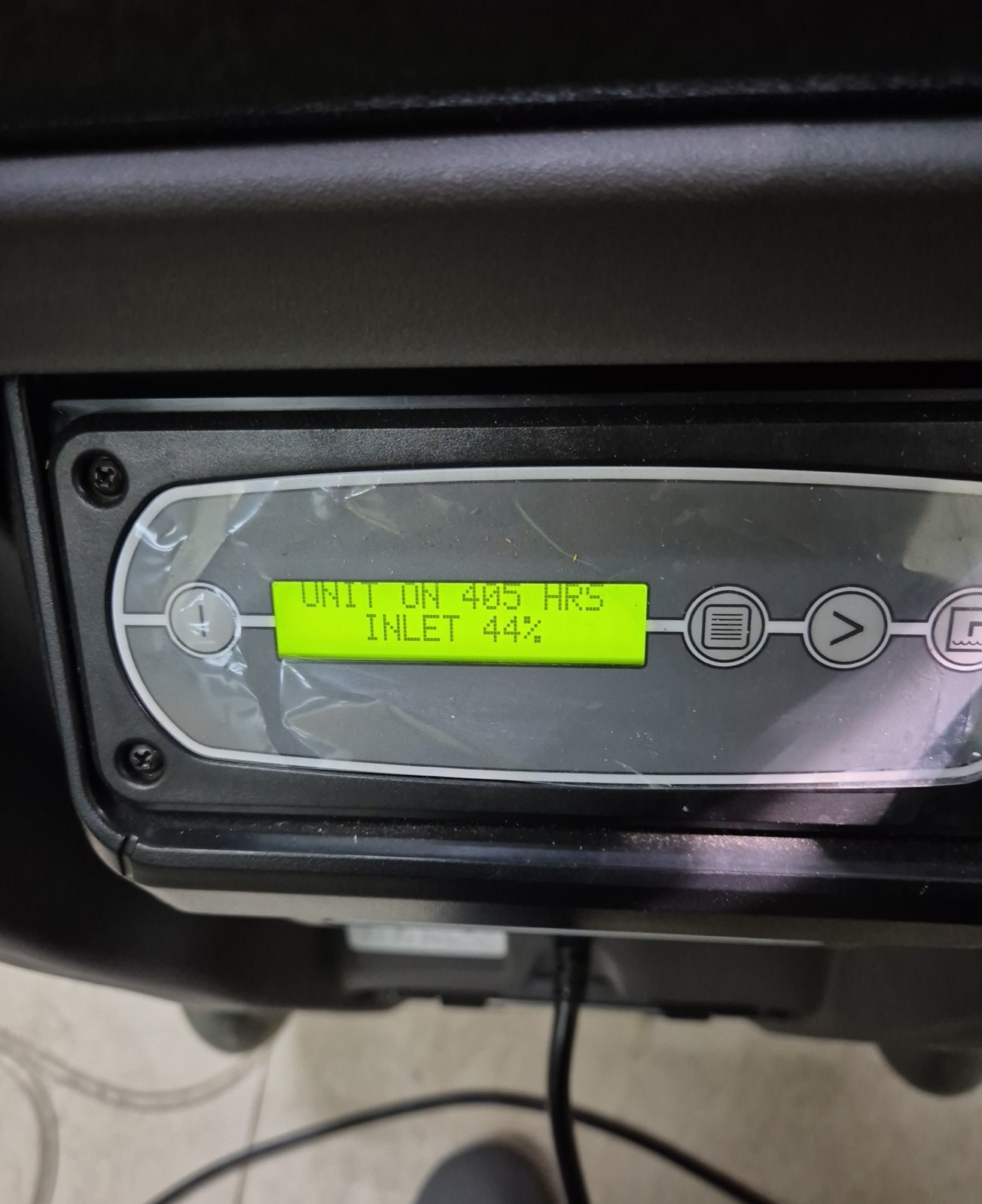 HEPA air scrubber control panel showing runtime hours and filter status