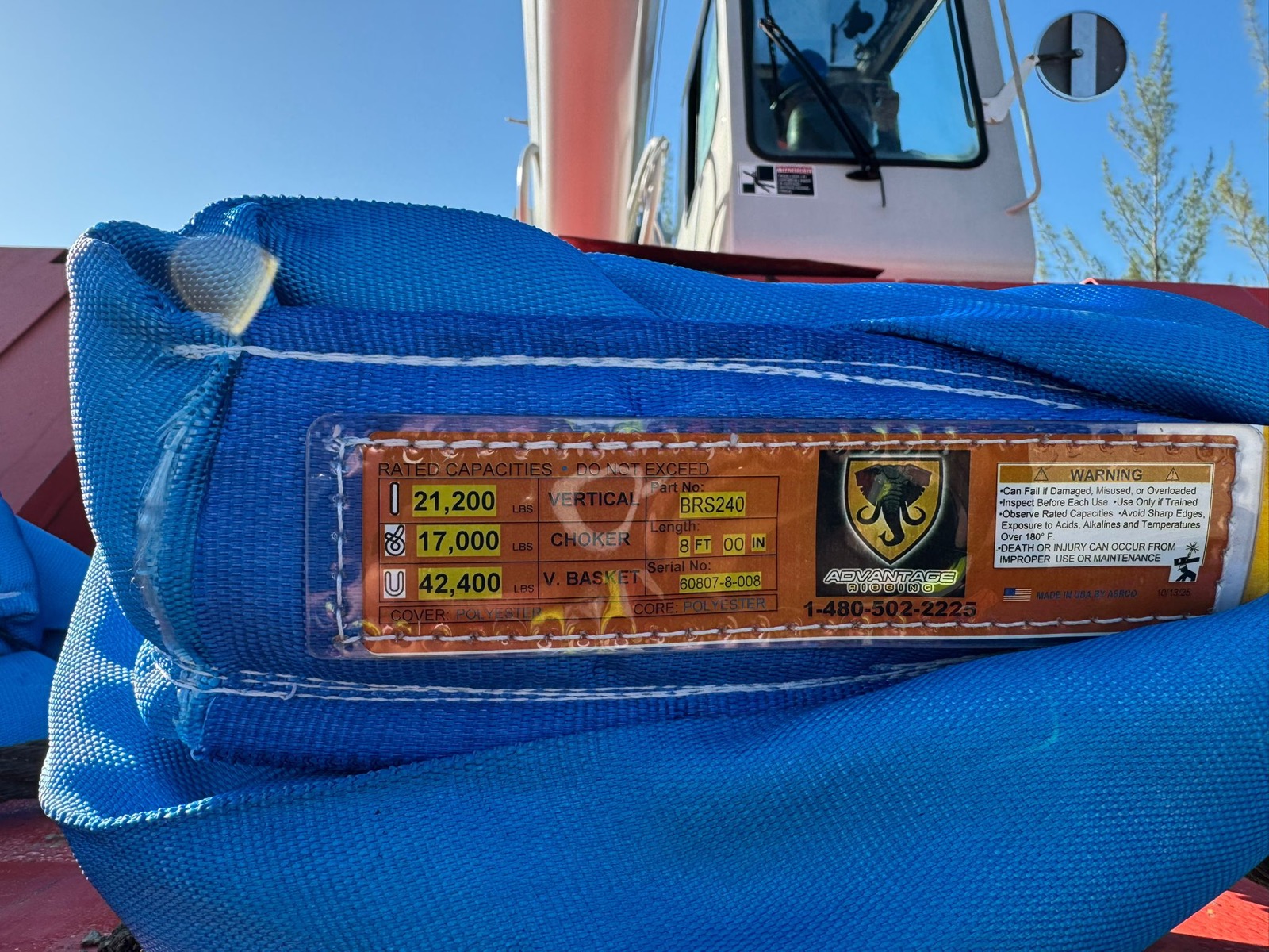 Close-up of a rigging strap safe working load tag
