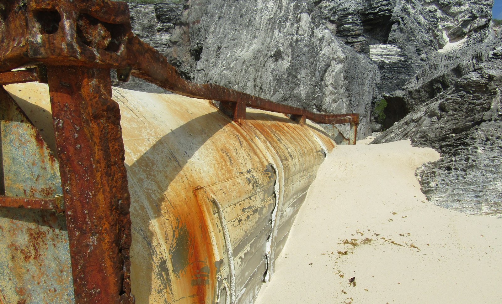 Detail of salvaged tank on Eleuthera shoreline