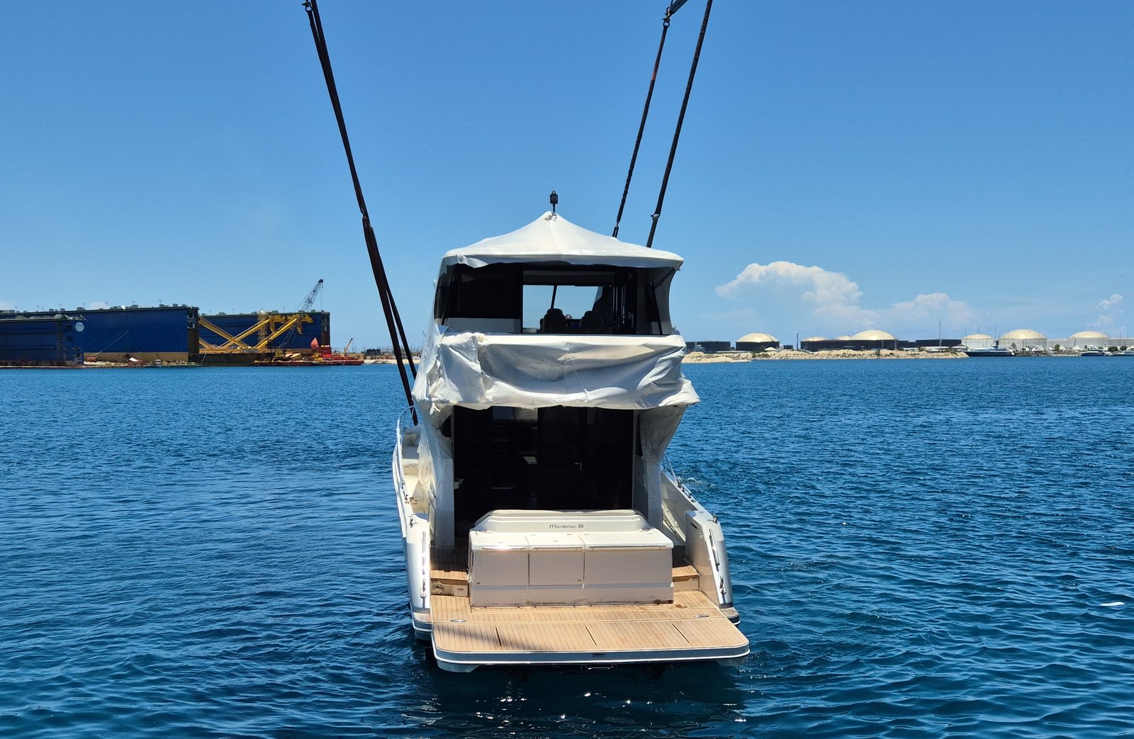 Stern detail of the yacht during discharge